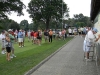 The crowd gathers at scoreboard Sunday