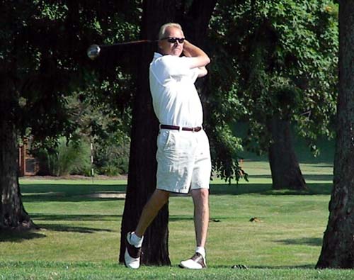 Norton Brick strikes his tee shot on the 18th hole at Big Met in the final round of the Senior Cleveland Am