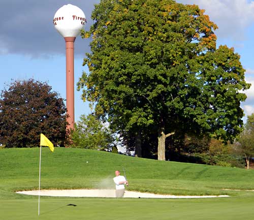 Aaron Crewse hits from the bunker on the 18th green at Firestone South in the 2012 ADGA GOY