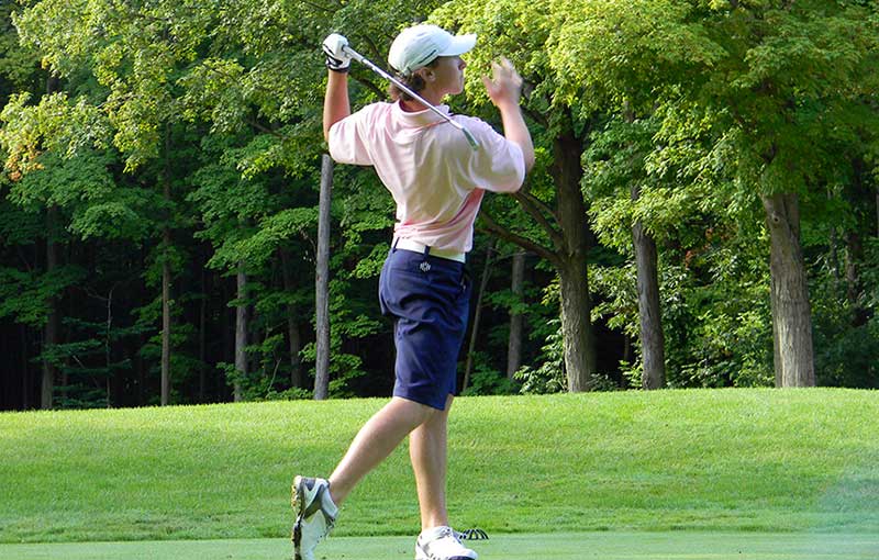 Nick Palladino of Highland Heights lets his tee shot fly on the 17th hole at Sleepy Hollow in Saturday's second round.