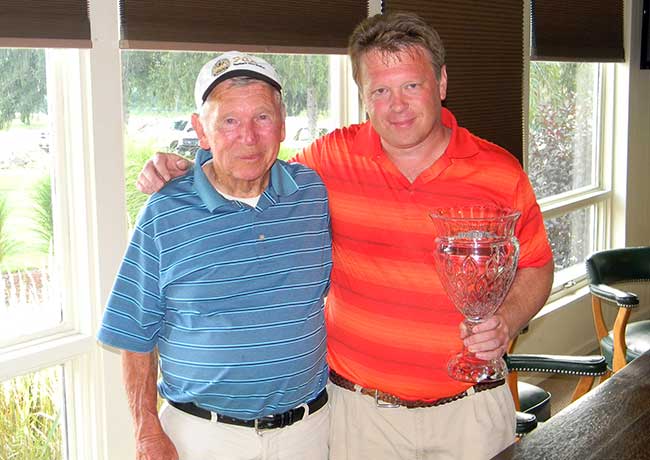 David Trier (right) and his Dad share in the victory at the 2014 Chippewa Championship on Sunday.