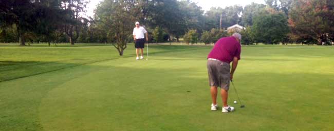 Dave Sotka sets up over the winning putt on the second playoff hole.