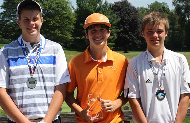 Ravenna's Paul Harris, champion, in the center, with Joey Vitali of Warren, on the left, runner-up, and Kyle Smith of Kent, third place.