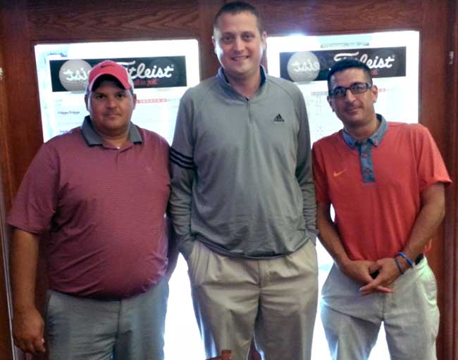 Dave Sotka (left) and Nick Anagnost (right) stand with Big Met pro John Dorsey after winning the Fall 2-M Scramble.