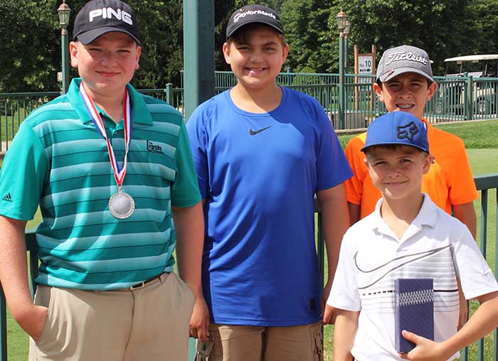 Rowan Baynes of Kent, Brandon Arnold of Deerfield, Christian Mineo of Kent (back), champion Jude Thiry of Mogadore (front)