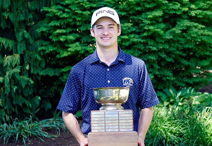 Cade Breitenstine with the 2020 NEO Am trophy