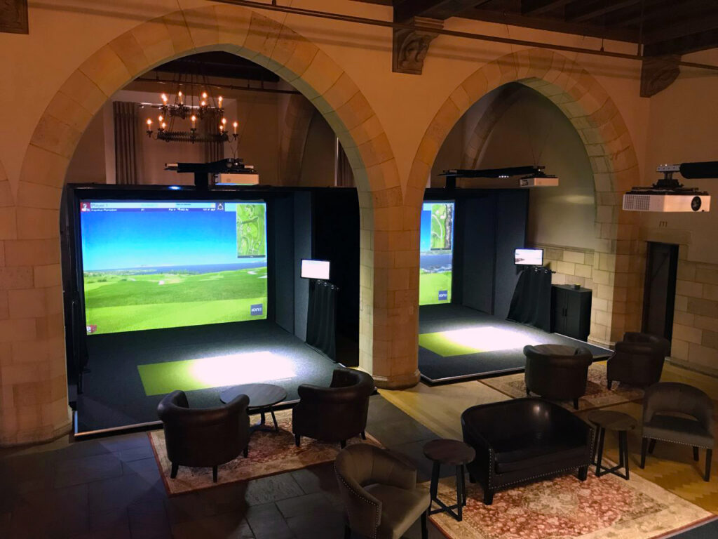 stone arches and simulators: Proximity Golf Lounge