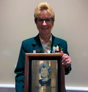 Marianne Reece with her Hall of Fame plaque