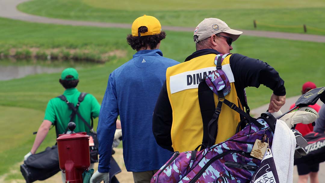 Players and caddies at the 2022 Haase Cup