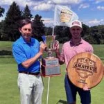 John Fiander presents the Cleveland Am trophy to Lucas Liberatore