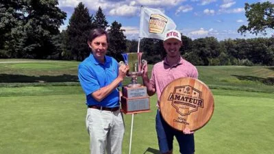 John Fiander presents the Cleveland Am trophy to Lucas Liberatore